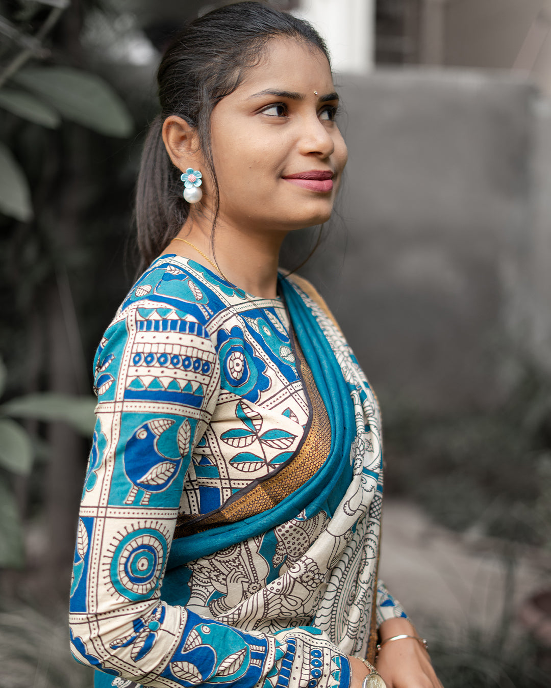 Blue Kalamkari silk saree with Nizam border