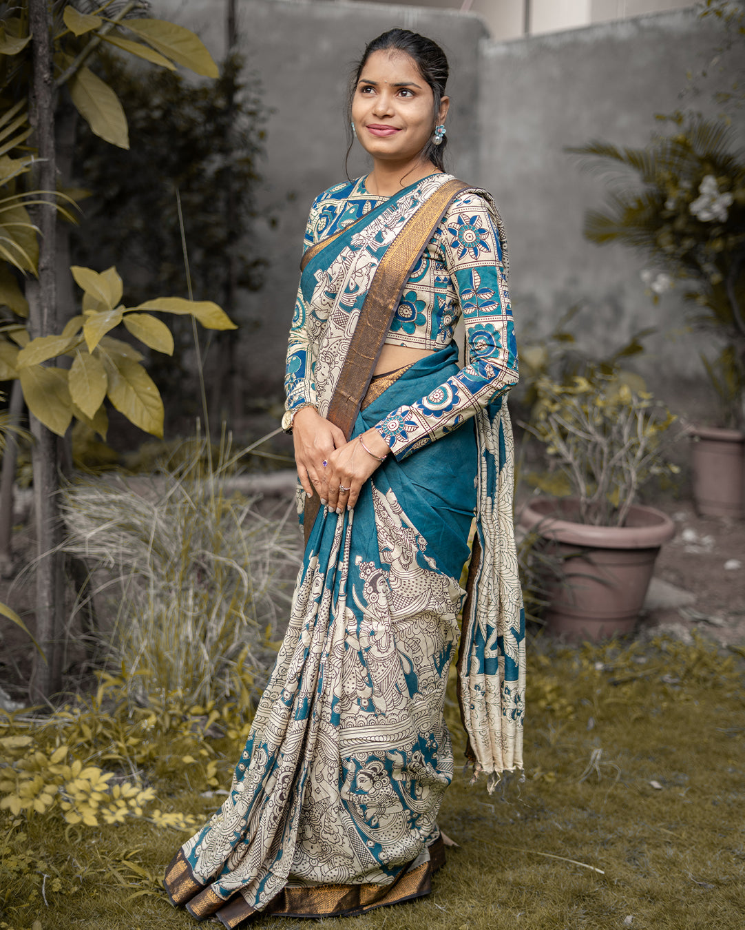 Blue Kalamkari silk saree with Nizam border